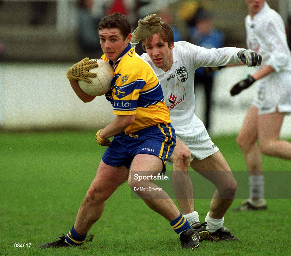 31 March 2002; Denis O'Driscoll of Clare is tackled by John Wiltshire of Kildare during the Allianz National Football League Division 1B Round 7 match between Kildare and Clare at St Conleth's Park in Newbridge, Kildare. Photo by Matt Browne/Sportsfile