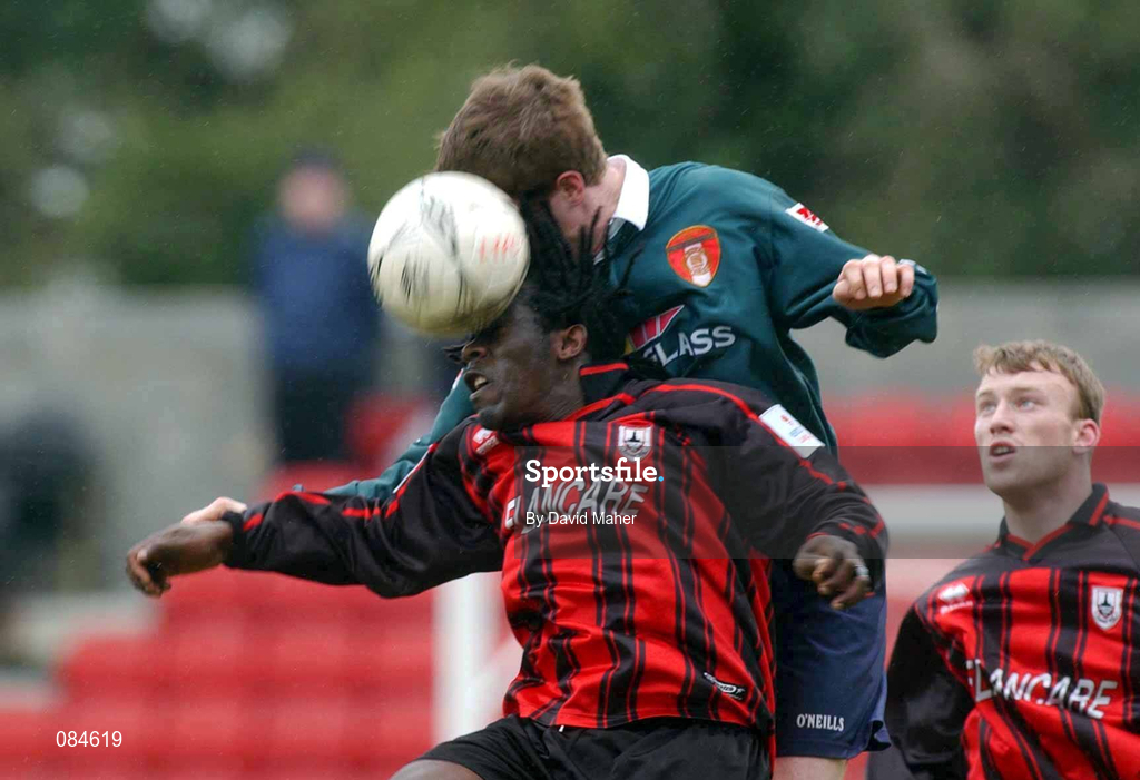 31 March 2002; Robbie Griffin of St Patrick's Athletic in action against Eric Levine of Longford Town during the eircom League Premier Division match between Longford Town and St Patrtick's Athletic at Flancare Park in Longford. Photo by David Maher/Sportsfile