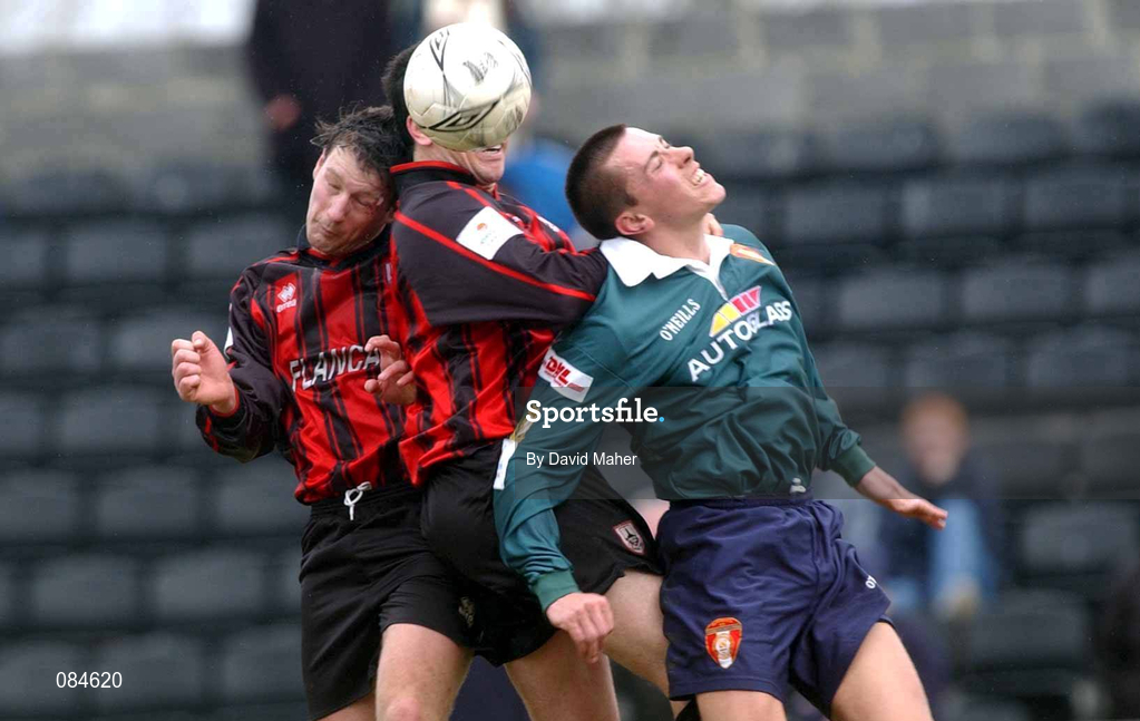 31 March 2002; Ger McCarthy of St Patrick's Athletic in action against Wesley Byrne and Stephen Kelly of Longford Town during the eircom League Premier Division match between Longford Town and St Patrtick's Athletic at Flancare Park in Longford. Photo by David Maher/Sportsfile
