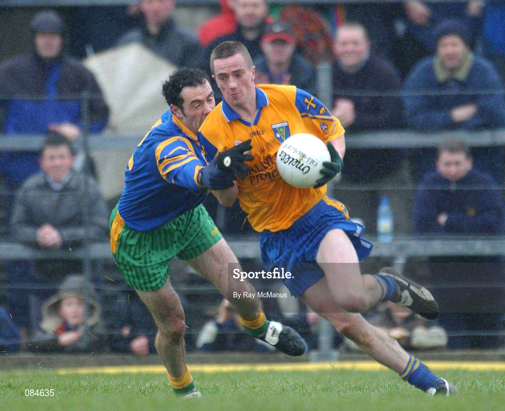 31 March 2002; Jonathan Dunning of Roscommon in action against Damien Diver of Donegal during the Allianz Football League Division 1A Round 7 match between Roscommon and Donegal at Dr Hyde Park in Roscommon. Please note Donegal wore the Roscommon  away strip due to a clash of jerseys. Photo by Ray McManus/Sportsfile