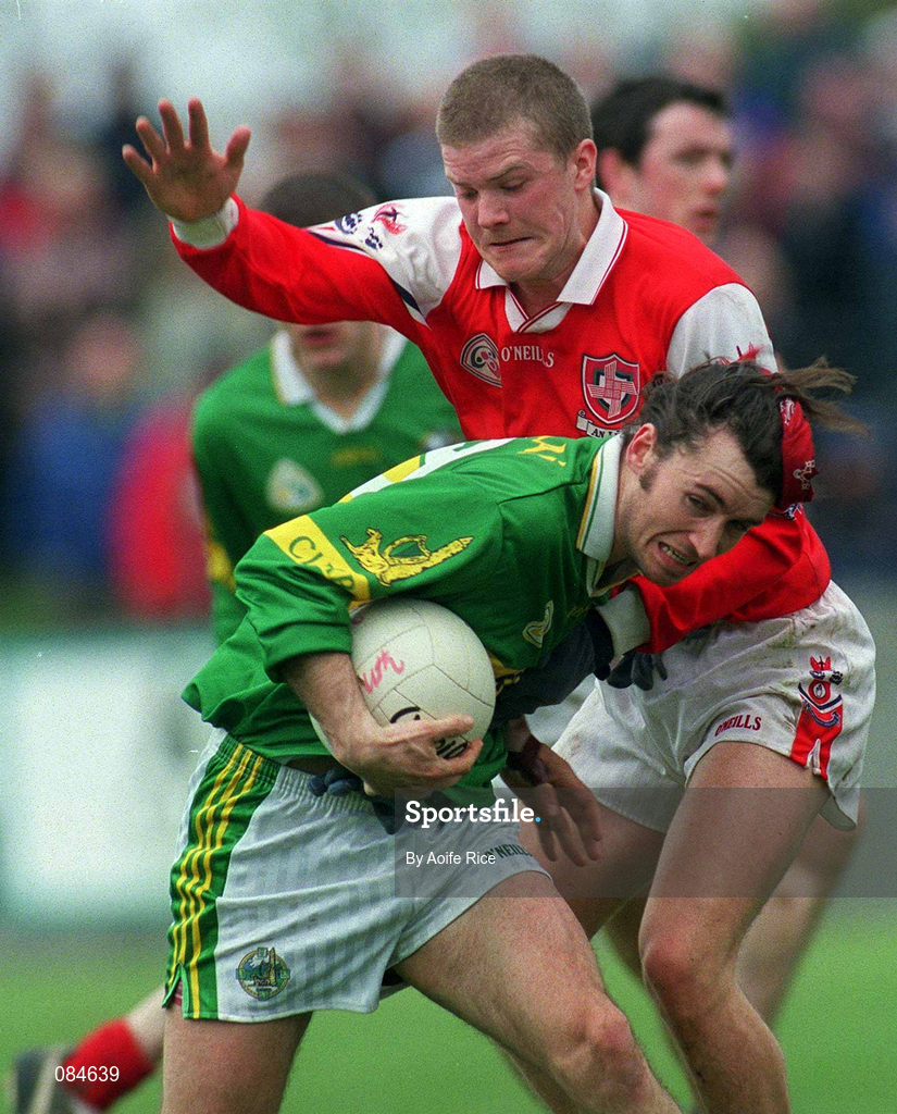 31 March 2002; Fionnan Kelliher of Kerry in action against Aaron Hoey of Louth during the Allianz National Football League Division 2A Round 7 match between Louth and Kerry at Páirc Mhuire in Ardee in Louth. Photo by Aoife Rice/Sportsfile