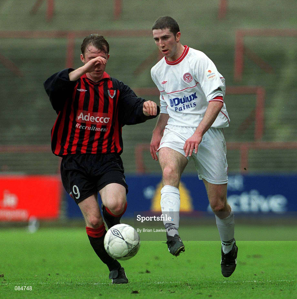 31 March 2002; Owen Heary of Shelbourne in action against Trevor Molloy of Bohemians during the eircom League Premier Division match between Bohemians and Shelbourne at Dalymount Park in Dublin. Photo b Brian Lawless/Sportsfile