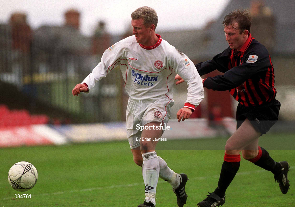 31 March 2002; Barry Prenderville of Shelbourne in action against Trevor Molloy of Bohemians during the eircom League Premier Division match between Bohemians and Shelbourne at Dalymount Park in Dublin. Photo b Brian Lawless/Sportsfile