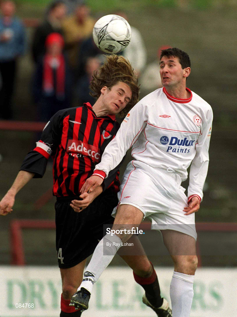 31 March 2002; Kevin Hunt of Bohemians in action against Brian Byrne of Shelbourne during the eircom League Premier Division match between Bohemians and Shelbourne at Dalymount Park in Dublin. Photo by Ray Lohan/Sportsfile