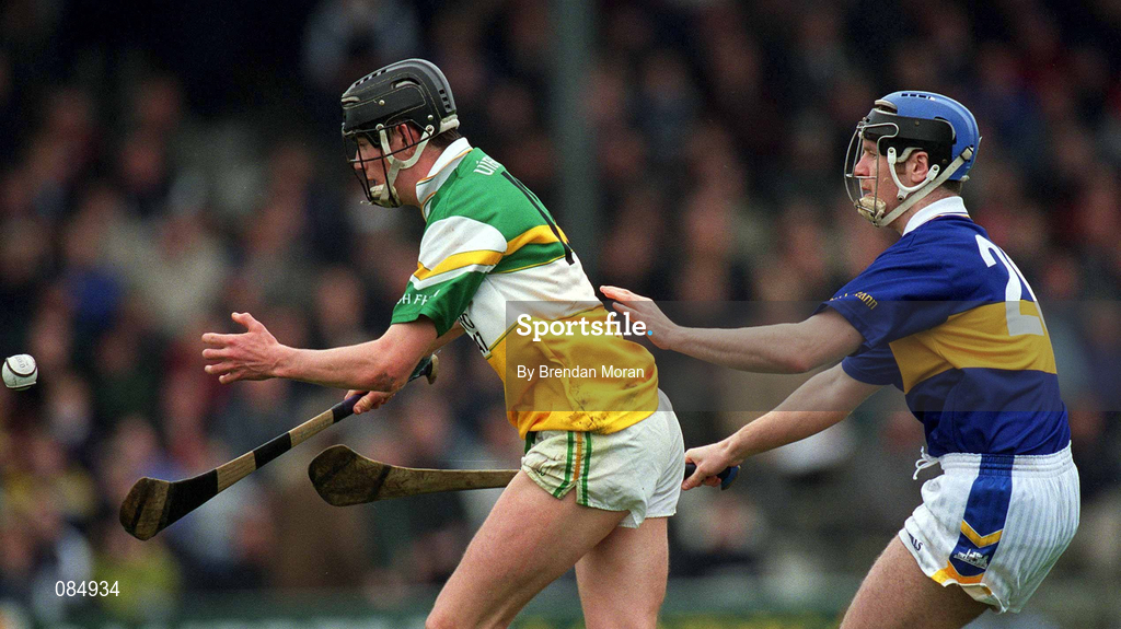 30 March 2002; Rory Hanniffy of Offaly in action against Michael Ryan of Tipperary during the Allianz National Hurling League Division 1B Round 1 match between Offaly and Tipperary in St Brendan's Park in Birr, Offaly. Photo by Brendan Moran/Sportsfile