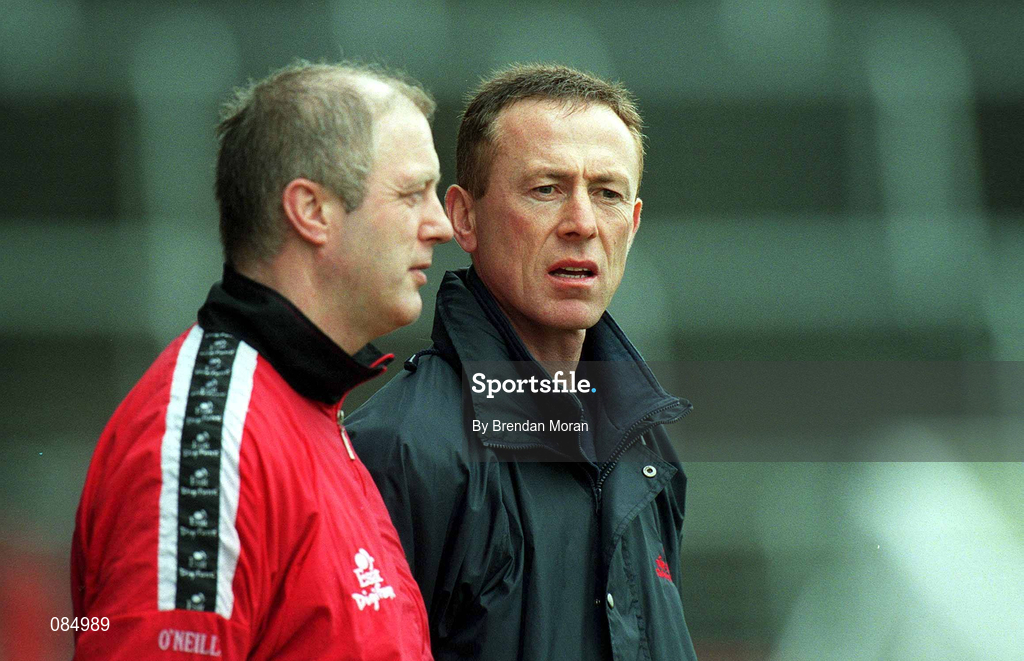 31 March 2002; Eugene McKenna, Tyrone manager, right, and Cork manager Larry Tompkins during the Allianz Football League Division 1A Round 7 match between Cork and Tyrone at Páirc Uí Chaoimh in Cork. Photo by Brendan Moran/Sportsfile
