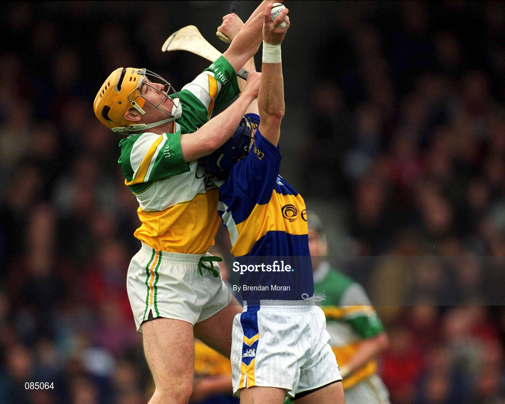 30 March 2002; Niall Claffey of Offaly in action against Benny Dunne of Tipperary during the Allianz National Hurling League Division 1B Round 1 match between Offaly and Tipperary in St Brendan's Park in Birr, Offaly. Photo by Brendan Moran/Sportsfile