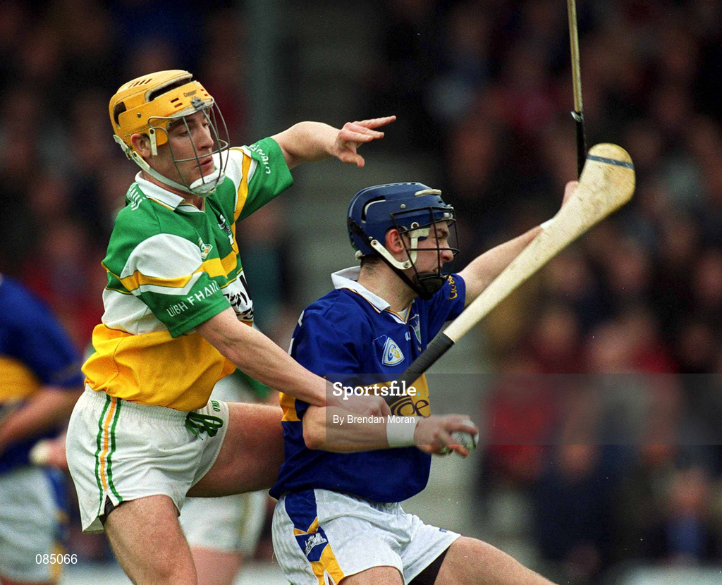 30 March 2002; Niall Claffey of Offaly in action against Benny Dunne of Tipperary during the Allianz National Hurling League Division 1B Round 1 match between Offaly and Tipperary in St Brendan's Park in Birr, Offaly. Photo by Brendan Moran/Sportsfile