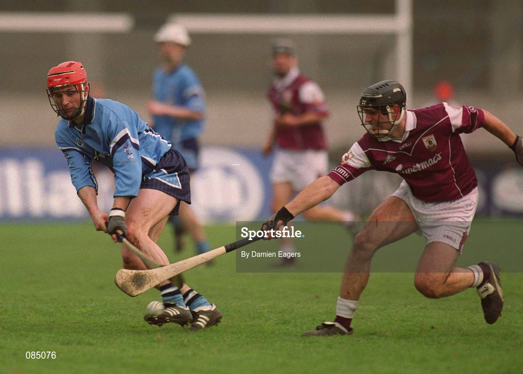30 March 2002; David Sweeney of Dublin is tackled by Cathal Moore of Galway during the Allianz Hurling League Division 1A Round 1 match between Dublin and Galway at Parnell Park in Dublin. Photo by Damien Eagers/Sportsfile