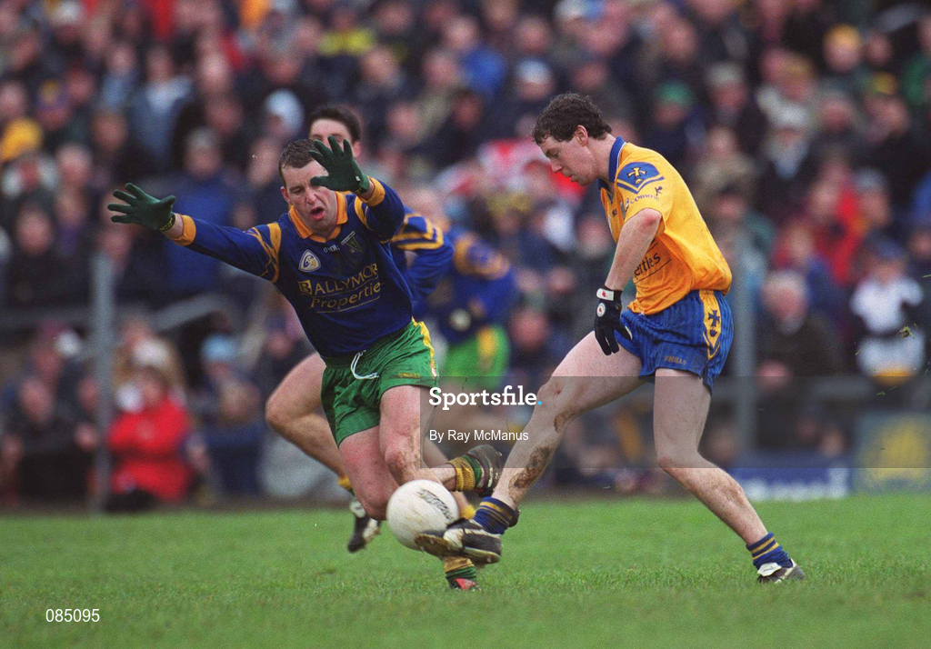 31 March 2002; Stephen Lohan of Roscommon in action against Barry Monaghan of Donegal during the Allianz Football League Division 1A Round 7 match between Roscommon and Donegal at Dr Hyde Park in Roscommon. Please note Donegal wore the Roscommon  away strip due to a clash of jerseys. Photo by Ray McManus/Sportsfile