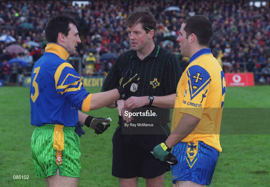 31 March 2002; Referee Michael Monahan with team captains Mark Crossan of Donegal, left, and Francie Grehan of Roscommon before the Allianz Football League Division 1A Round 7 match between Roscommon and Donegal at Dr Hyde Park in Roscommon. Please note Donegal wore the Roscommon  away strip due to a clash of jerseys. Photo by Ray McManus/Sportsfile