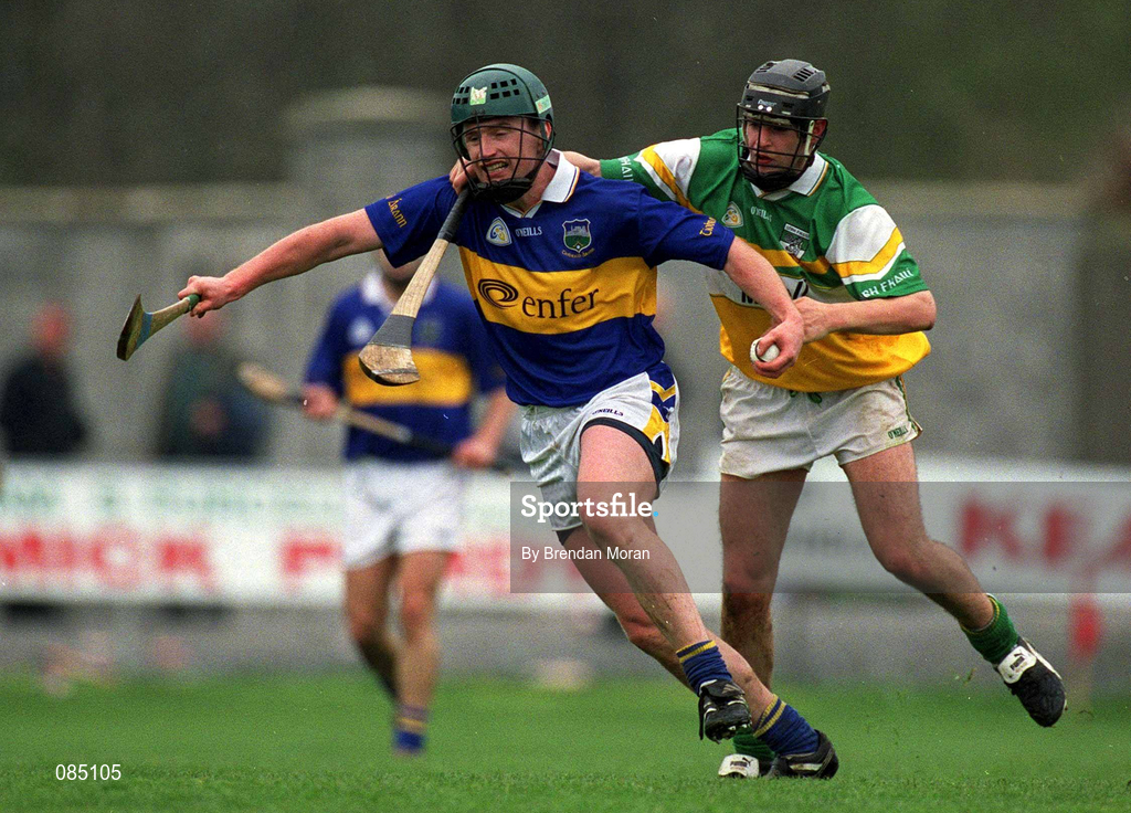 30 March 2002; David Kennedy of Tipperary in action against Brendan Murphy of Offaly during the Allianz National Hurling League Division 1B Round 1 match between Offaly and Tipperary in St Brendan's Park in Birr, Offaly. Photo by Brendan Moran/Sportsfile