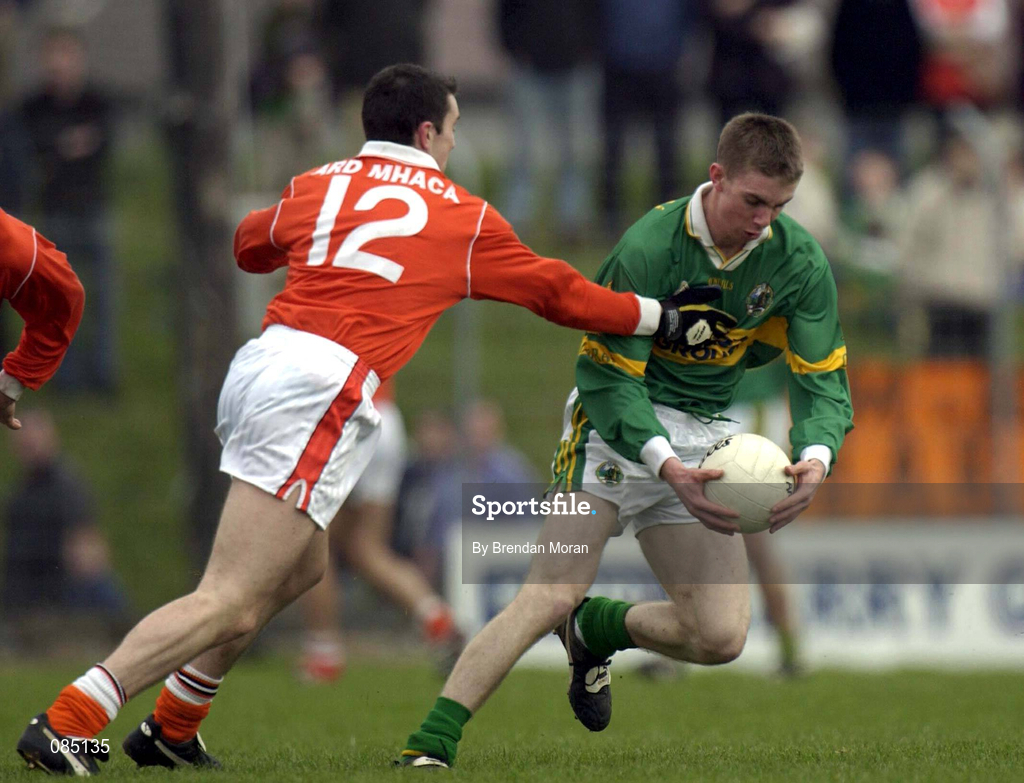 24 March 2002; Marc Ó Sé of Kerry in action against Oisín McConville of Armagh during the Allianz National Football League Division 2A Round 6 match between Kerry and Armagh at Austin Stack Park in Tralee, Kerry. Photo by Brendan Moran/Sportsfile