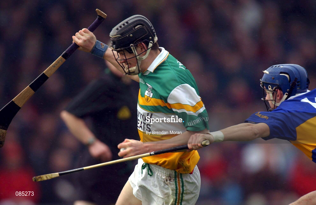 30 March 2002; Rory Hannify of Offaly in action against Mark O'Leary of Tipperary  during the Allianz National Hurling League Division 1B Round 1 match between Offaly and Tipperary in St Brendan's Park in Birr, Offaly. Photo by Brendan Moran/Sportsfile