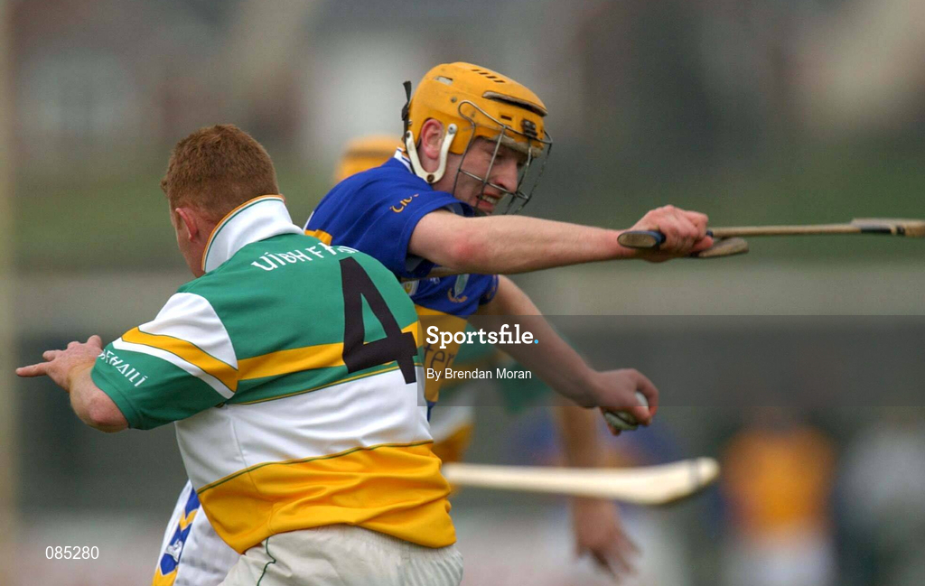 30 March 2002; Liam Cahill of Tipperary in action against Seamus Tooher of Offaly during the Allianz National Hurling League Division 1B Round 1 match between Offaly and Tipperary in St Brendan's Park in Birr, Offaly. Photo by Brendan Moran/Sportsfile