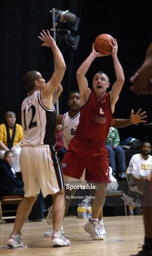 24 March 2002; John Teahan of Frosties Tigers Tralee in action against John Quigley Dart Killester during the ESB Men's National Championships Final match between Frosties Tigers Tralee and Dart Killester in the National Exhibition Centre in Killarney, Kerry. Photo by Brendan Moran/Sportsfile