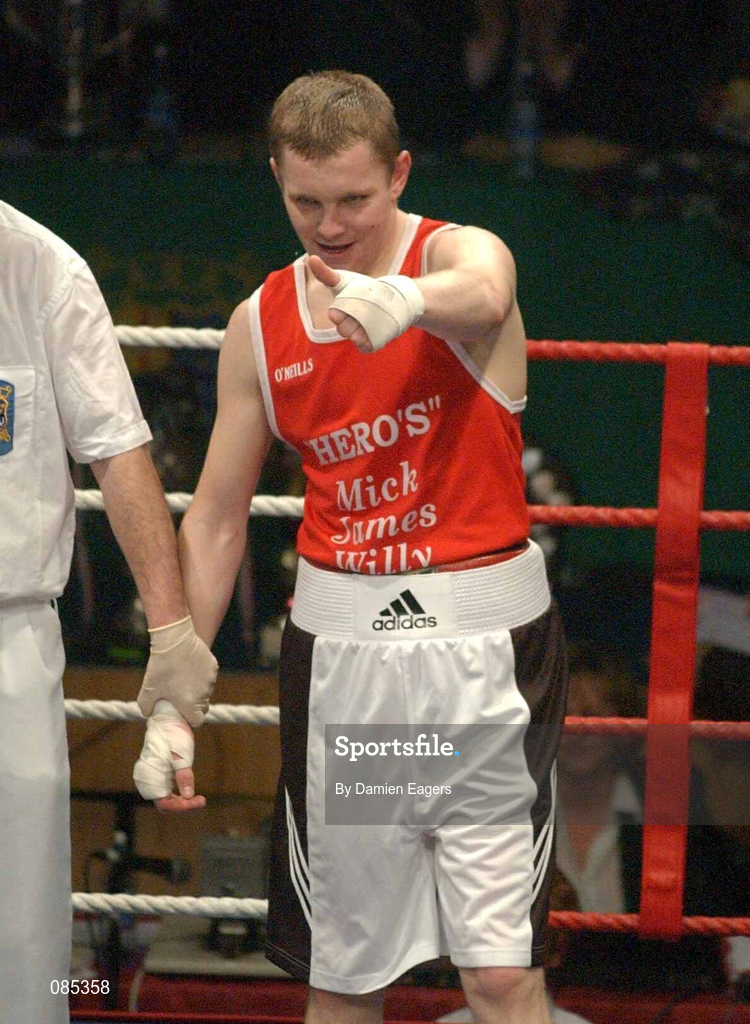 22 February 2002; James Moore of Arklow, Wicklow, celebrates victory over David Conlon of Crumlin Boxing Club, Dublin, in their Welterweight Final during the National Senior Boxing Championships 2002 at The National Stadium in Dublin. Photo by Damien Eagers/Sportsfile