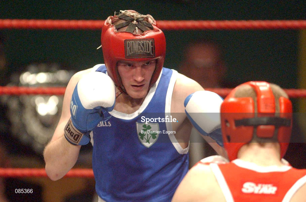 22 February 2002; David Conlon of Crumlin Boxing Club, Dublin, left, during the Welterweight Final against James Moore of Arklow, Wicklow, during the National Senior Boxing Championships 2002 at The National Stadium in Dublin. Photo by Damien Eagers/Sportsfile