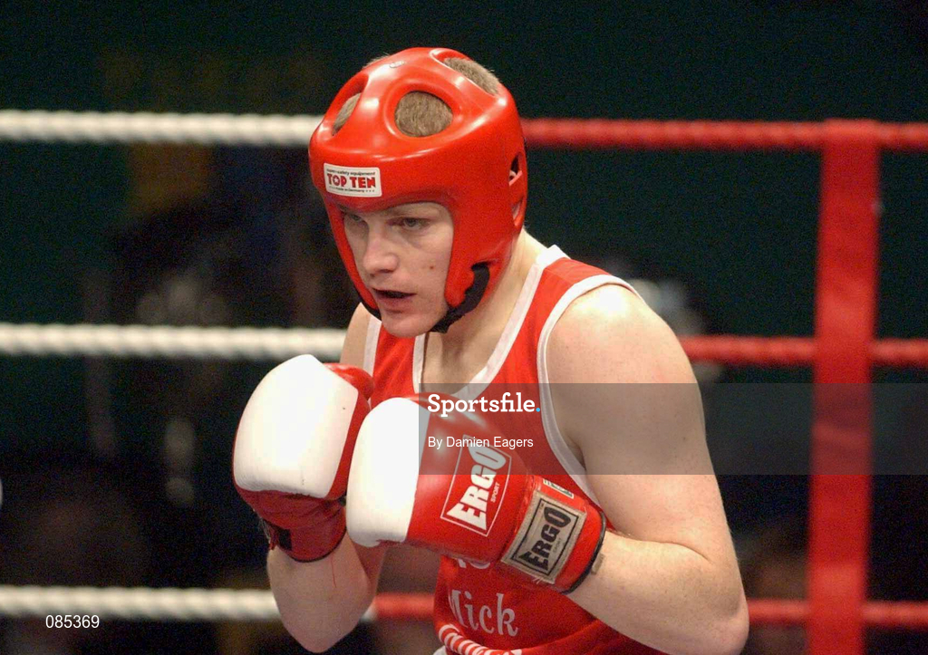 22 February 2002; James Moore of Arklow, Wicklow, in their Welterweight Final against David Conlon of Crumlin Boxing Club, Dublin, during the National Senior Boxing Championships 2002 at The National Stadium in Dublin. Photo by Damien Eagers/Sportsfile