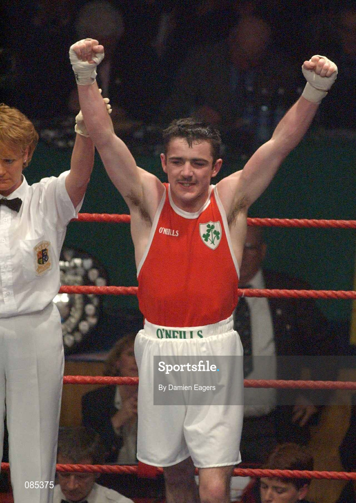 22 February 2002; Stephen Ormonde of Quarryvale Boxing Club, Dublin, celebrates after beating Gavin Brown of Crumlin Boxing Club, Dublin, in their Featherweight Final at the National Senior Boxing Championships at The National Stadium in Dublin. Photo by Damien Eagers/Sportsfile