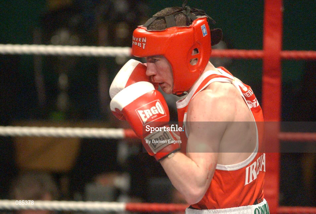 22 February 2002; Damien McKenna of Holy Family Boxing Club, Drogheda, in the 54kg bout against Martin Lindsey during the National Senior Boxing Championships 2002 at The National Stadium in Dublin. Photo by Damien Eagers/Sportsfile