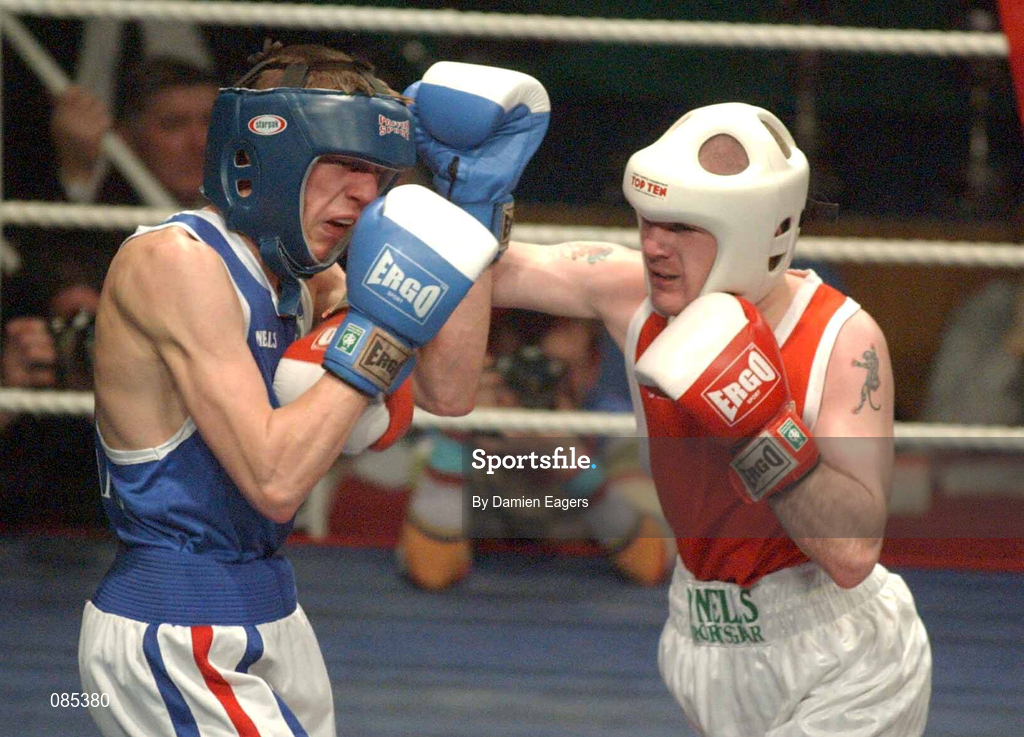 22 February 2002; Darren Campbell of St Saviours Boxing Club, Dublin, right, in action against Liam Cunningham of Saints Boxing Club, Belfast, during their Fly Weight Final at the National Senior Boxing Championships 2002 at The National Stadium in Dublin. Photo by Damien Eagers/Sportsfile