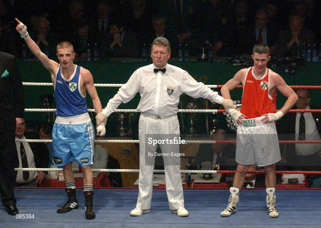 22 February 2002; Martin Lindsey of Immaculata Belfast, left, celebrates after victory over Damien McKenna of Holy Family Boxing Club, Drogheda, in their Bantamweight Final during the National Senior Boxing Championships 2002 at The National Stadium in Dublin. Photo by Damien Eagers/Sportsfile