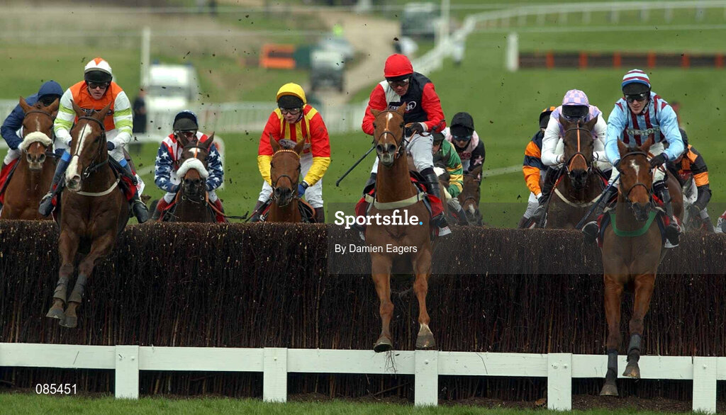 12 March 2002; Competitors, from left, Latalomne, with V.T Keane up, Cenkos with Timmy Murphy up, and Edredon Bleu, with Tony McCoy up, clear the last first time around The Queen Mother Champion Steeple Chase during Day One of the Cheltenham Racing Festival at Prestbury Park in Cheltenham, England. Photo by Damien Eagers/Sportsfile