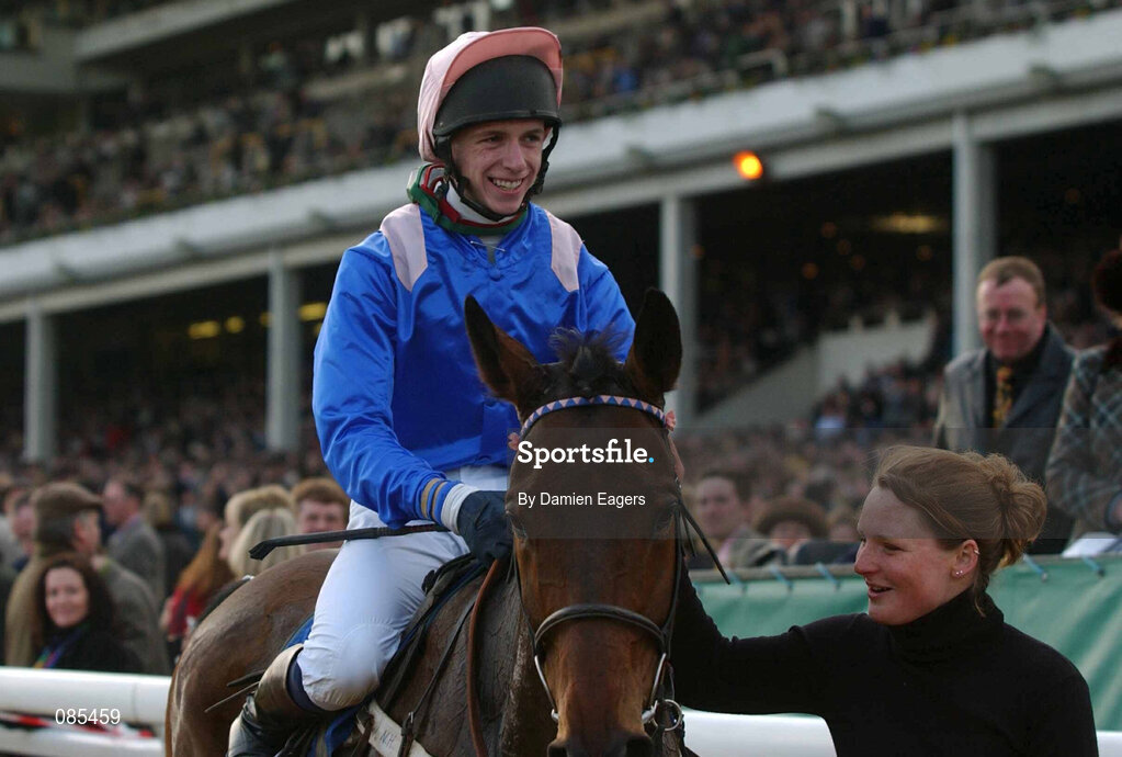 12 March 2002; The Bushkeeper with Mr David Crosse up celebrates after winning The Fulke Walwyn Kim Muir Challenge Cup Handicap Steeplechase during Day One of the Cheltenham Racing Festival at Prestbury Park in Cheltenham, England. Photo by Damien Eagers/Sportsfile