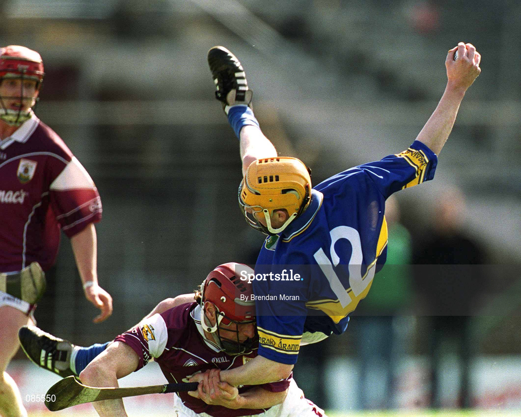 14 April 2002; Lar Corbett of Tipperary in action against Declan O'Brien of Galway during the Allianz National Hurling League Quarter-Final match between Galway and Tipperary at Semple Stadium in Thurles, Tipperary. Photo by Brendan Moran/Sportsfile