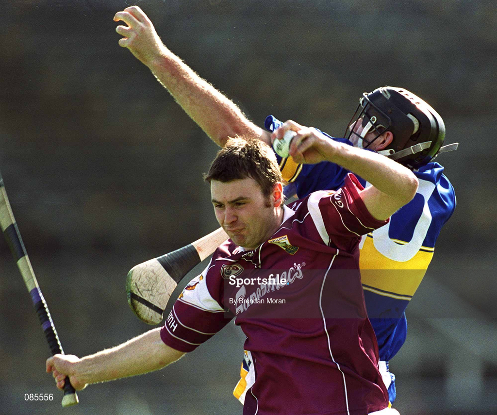 14 April 2002; Richie Murray of Galway fields a high ball ahead of Mark O'Leary of Tipperary during the Allianz National Hurling League Quarter-Final match between Galway and Tipperary at Semple Stadium in Thurles, Tipperary. Photo by Brendan Moran/Sportsfile