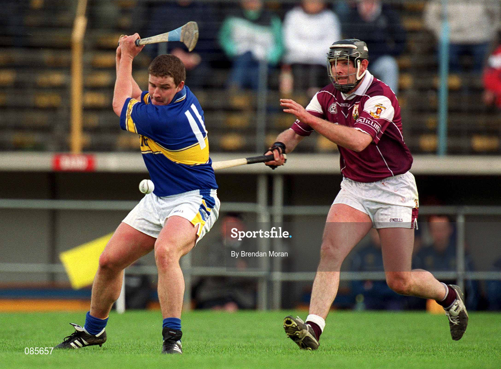 14 April 2002; John Carroll of Tipperary in action against Joe Rabbitte of Galway during the Allianz National Hurling League Quarter-Final match between Galway and Tipperary at Semple Stadium in Thurles, Tipperary. Photo by Brendan Moran/Sportsfile