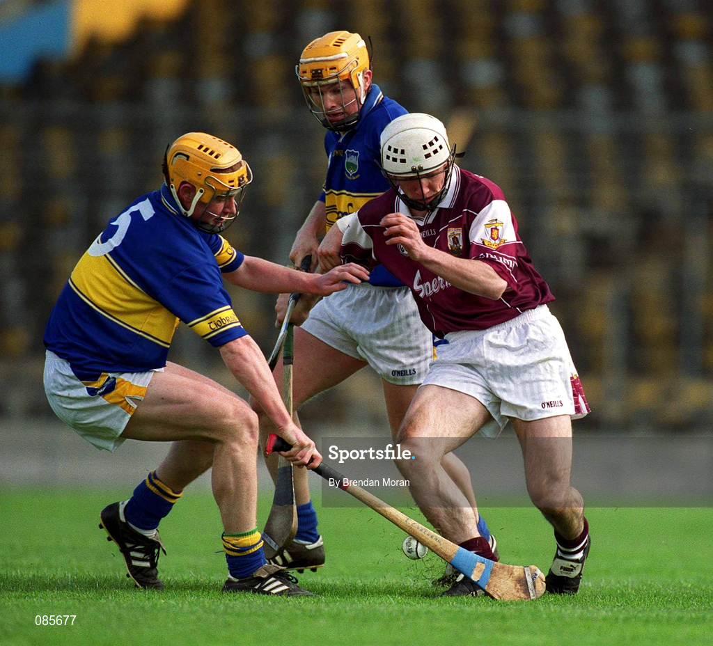 14 April 2002; Niall Hayes of Galway in action against Eamonn Corcoran, left and Conor Gleeson of Tipperary during the Allianz National Hurling League Quarter-Final match between Galway and Tipperary at Semple Stadium in Thurles, Tipperary. Photo by Brendan Moran/Sportsfile
