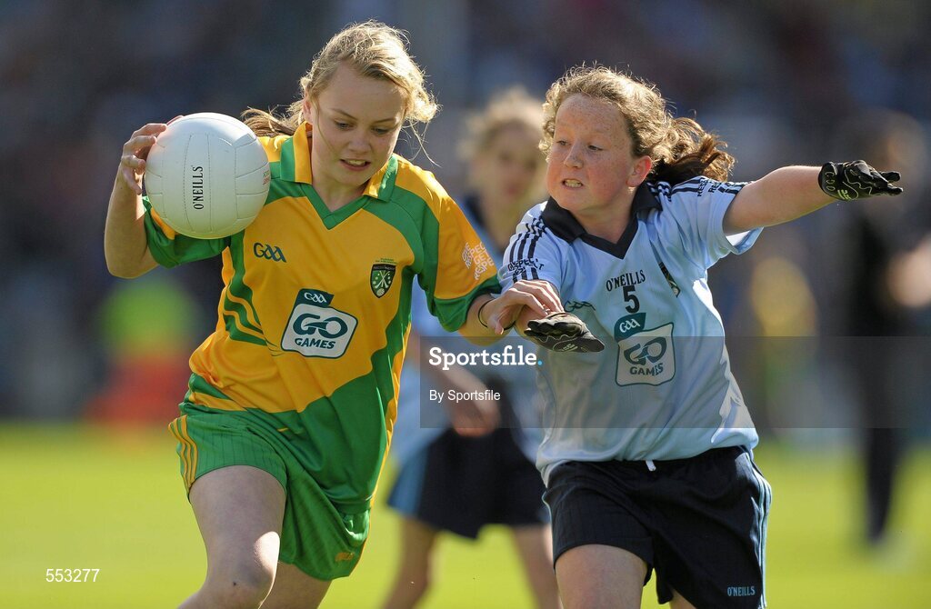 28 August 2011; Chantelle Lynam, St. Brigid's N.S., Knockbridge, Co. Louth, in action against Roisin Kelly, Kilmyshall, Bunclody, Co. Wexford. Go Games Exhibition - Sunday 21st August 2011, Clonliffe College, Dublin. Photo by Sportsfile