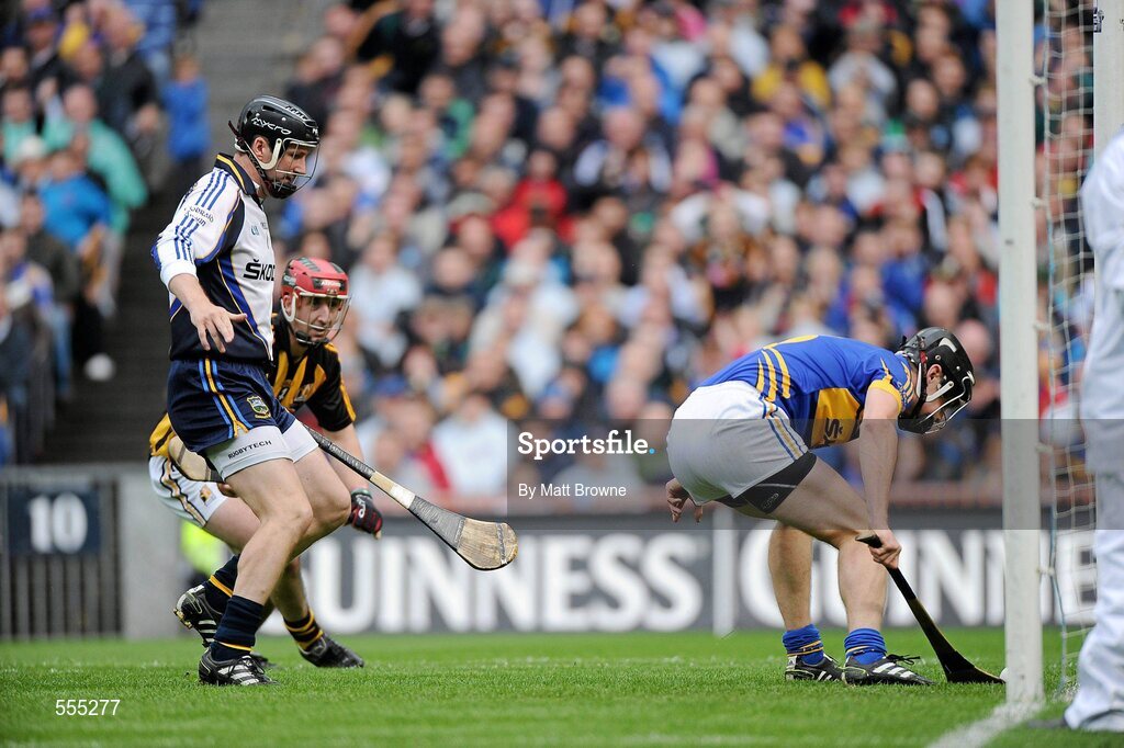 4 September 2011; Paul Curran, Tipperary, takes the ball off the line after it went past goal-keeper Brendan Cummins and Kilkenny's Eoin Larkin. GAA Hurling All-Ireland Senior Championship Final, Kilkenny v Tipperary, Croke Park, Dublin. Picture credit: Matt Browne / SPORTSFILE