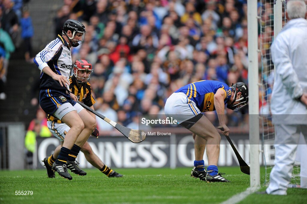 4 September 2011; Paul Curran, Tipperary, takes the ball off the line after it went past goal-keeper Brendan Cummins and Kilkenny's Eoin Larkin. GAA Hurling All-Ireland Senior Championship Final, Kilkenny v Tipperary, Croke Park, Dublin. Picture credit: Matt Browne / SPORTSFILE