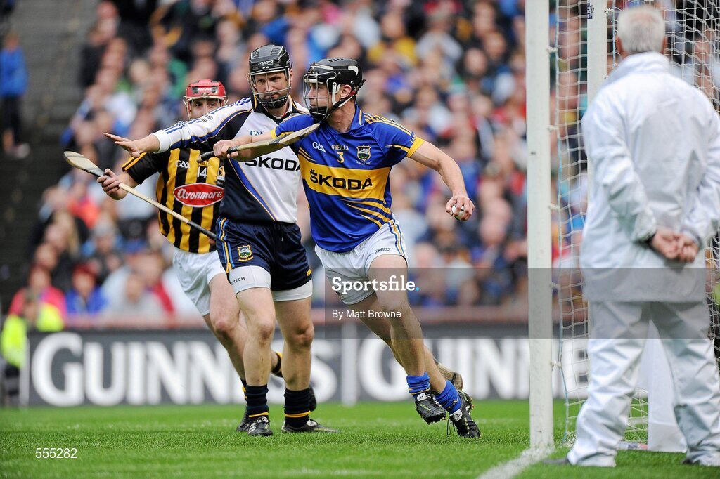4 September 2011; Paul Curran, Tipperary, comes away with the ball after taking it off the line after it went past goal-keeper Brendan Cummins and Kilkenny's Eoin Larkin. GAA Hurling All-Ireland Senior Championship Final, Kilkenny v Tipperary, Croke Park, Dublin. Picture credit: Matt Browne / SPORTSFILE