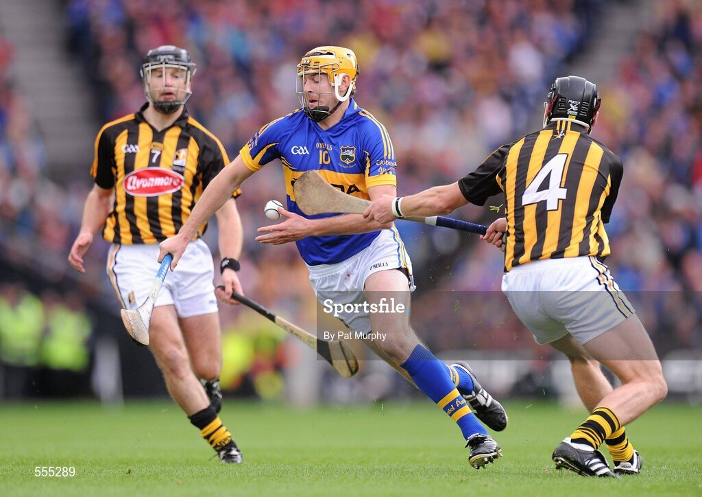 4 September 2011; Seamus Callanan, Tipperary, in action against Jackie Tyrrell, 4, and JJ Delaney, Kilkenny. GAA Hurling All-Ireland Senior Championship Final, Kilkenny v Tipperary, Croke Park, Dublin. Picture credit: Pat Murphy / SPORTSFILE
