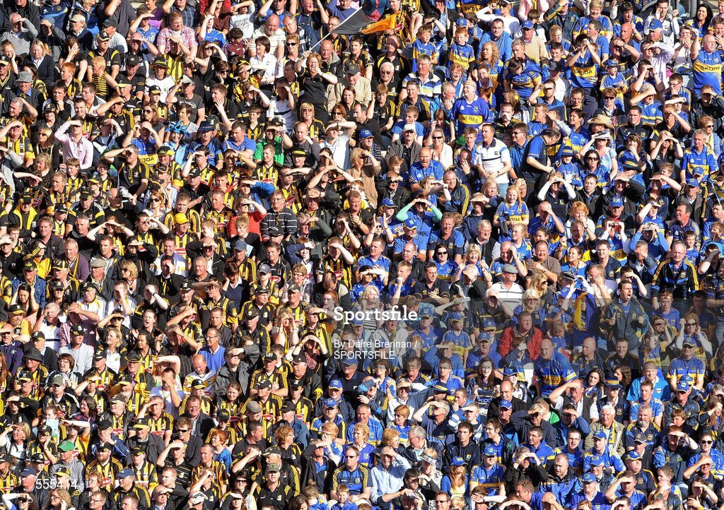 4 September 2011; Kilkenny and Tipperary supporters sit together in the Cusack Stand. Supporters at the GAA Hurling All-Ireland Championship Finals, Croke Park, Dublin. Picture credit: Dáire Brennan / SPORTSFILE