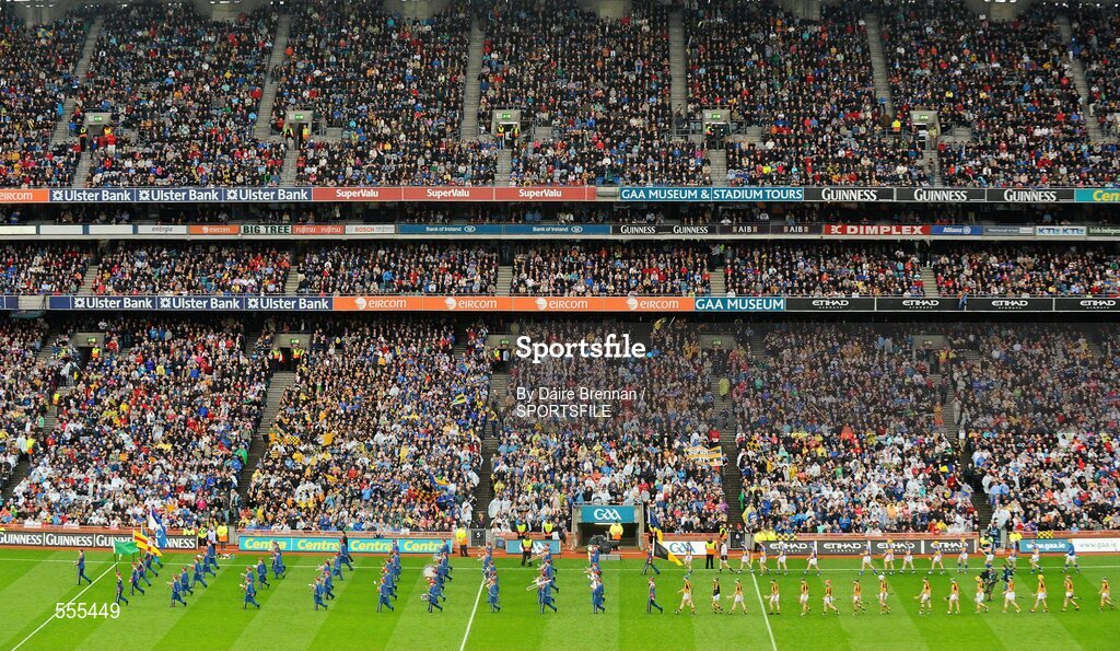 4 September 2011; The Kilkenny and Tipperary teams follow the Artane School of Music band during the pre-match parade. GAA Hurling All-Ireland Senior Championship Final, Kilkenny v Tipperary, Croke Park, Dublin. Picture credit: Dáire Brennan / SPORTSFILE