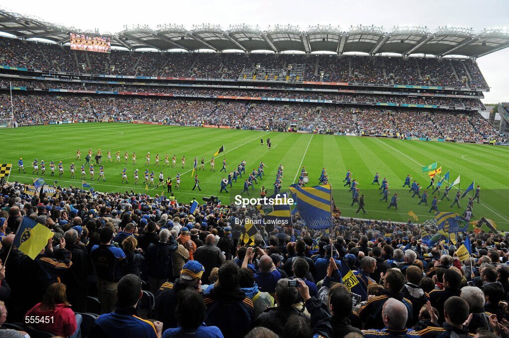 4 September 2011; The Kilkenny and Tipperary teams follow the Artane School of Music band during the pre-match parade. GAA Hurling All-Ireland Senior Championship Final, Kilkenny v Tipperary, Croke Park, Dublin. Picture credit: Brian Lawless / SPORTSFILE