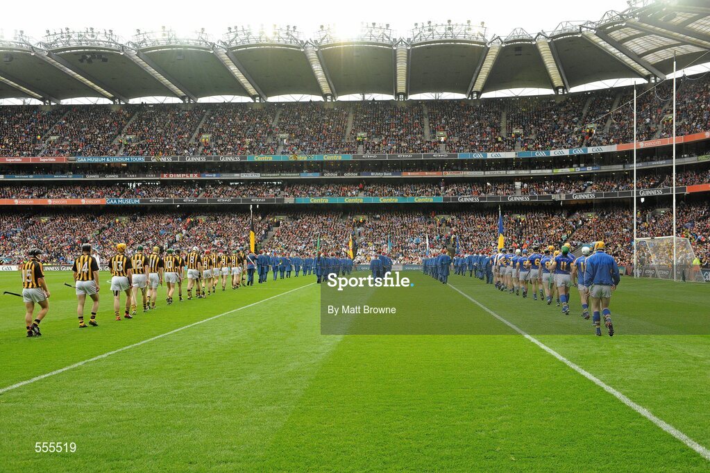 4 September 2011; The Kilkenny and Tipperary teams follow the Artane School of Music band during the pre-match parade. GAA Hurling All-Ireland Senior Championship Final, Kilkenny v Tipperary, Croke Park, Dublin. Picture credit: Matt Browne / SPORTSFILE