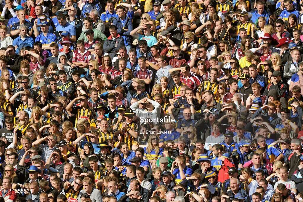 4 September 2011; Kilkenny and Tipperary supporters shield their eyes from the sun on Hill 16. GAA Hurling All-Ireland Senior Championship Final, Kilkenny v Tipperary, Croke Park, Dublin. Picture credit: Brian Lawless / SPORTSFILE