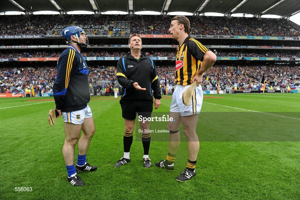 4 September 2011; Kilkenny captain Brian Hogan and Tipperary captain Eoin Kelly with referee Brian Gavin for the coin toss. GAA Hurling All-Ireland Senior Championship Final, Kilkenny v Tipperary, Croke Park, Dublin. Picture credit: Brian Lawless / SPORTSFILE