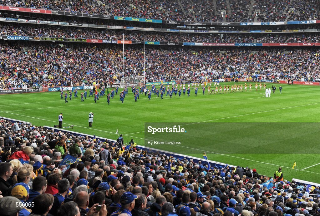 4 September 2011; The Kilkenny and Tipperary teams follow the Artane School of Music band during the pre-match parade. GAA Hurling All-Ireland Senior Championship Final, Kilkenny v Tipperary, Croke Park, Dublin. Picture credit: Brian Lawless / SPORTSFILE