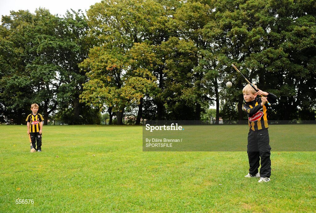 4 September 2011; Seán O'Keefe, aged 6, from Thomastown, Co. Kilkenny, pucks the ball to his friend Kyle Jordan, also aged 6, from Thomastown. Supporters at the GAA Hurling All-Ireland Championship Finals, Croke Park, Dublin. Picture credit: Dáire Brennan / SPORTSFILE