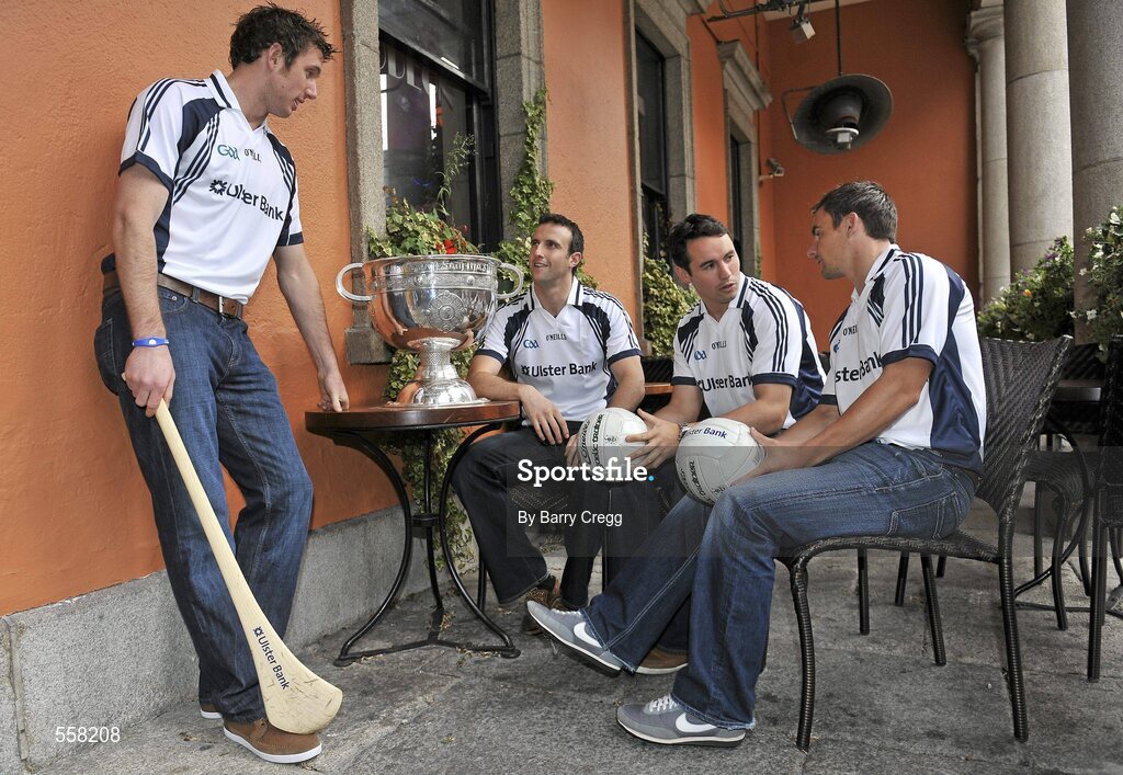 12 September 2011; Ulster Bank GAA stars with the Sam Maguire cup,  from left to right, 2011 All-Ireland medal winner Michael Fennelly, Galway footballer Joe Bergin, Galway footballer Finian Hanley, and Down footballer Danny Hughes at the 2011 ‘Off the Ball Roadshow with Ulster Bank’ finale. The Ulster Bank GAA stars were out in force, alongside a host of sporting greats, as the finale of the 2011 ‘Off the Ball Roadshow with Ulster Bank’ took over the Odeon Bar on Dublin’s Harcourt Street on Monday, 12th September. For the third year running, Ulster Bank teamed up with Newstalk 106-108 fm to take Ireland’s most popular sports programme on a tour across the country, where rival Ulster Bank GAA stars have featured in live shows in Kerry, Cork, Donegal, Limerick, Tipperary, Galway and Roscommon, throughout the summer. This year also saw the introduction of a major new club focused initiative – ‘Ulster Bank GAA Force’. The initiative was set up to support local GAA clubs across the country by giving them the opportunity to refurbish and upgrade their facilities. The Odeon Bar, Harcourt Street, Dublin. Picture credit: Barry Cregg / SPORTSFILE