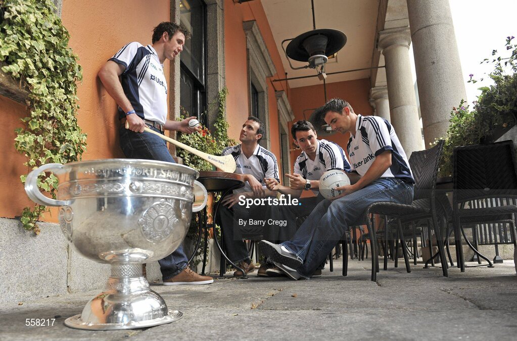 12 September 2011; Ulster Bank GAA stars with the Sam Maguire cup,  from left to right, 2011 All-Ireland medal winner Michael Fennelly, Galway footballer Joe Bergin, Galway footballer Finian Hanley, and Down footballer Danny Hughes at the 2011 ‘Off the Ball Roadshow with Ulster Bank’ finale. The Ulster Bank GAA stars were out in force, alongside a host of sporting greats, as the finale of the 2011 ‘Off the Ball Roadshow with Ulster Bank’ took over the Odeon Bar on Dublin’s Harcourt Street on Monday, 12th September. For the third year running, Ulster Bank teamed up with Newstalk 106-108 fm to take Ireland’s most popular sports programme on a tour across the country, where rival Ulster Bank GAA stars have featured in live shows in Kerry, Cork, Donegal, Limerick, Tipperary, Galway and Roscommon, throughout the summer. This year also saw the introduction of a major new club focused initiative – ‘Ulster Bank GAA Force’. The initiative was set up to support local GAA clubs across the country by giving them the opportunity to refurbish and upgrade their facilities. The Odeon Bar, Harcourt Street, Dublin. Picture credit: Barry Cregg / SPORTSFILE