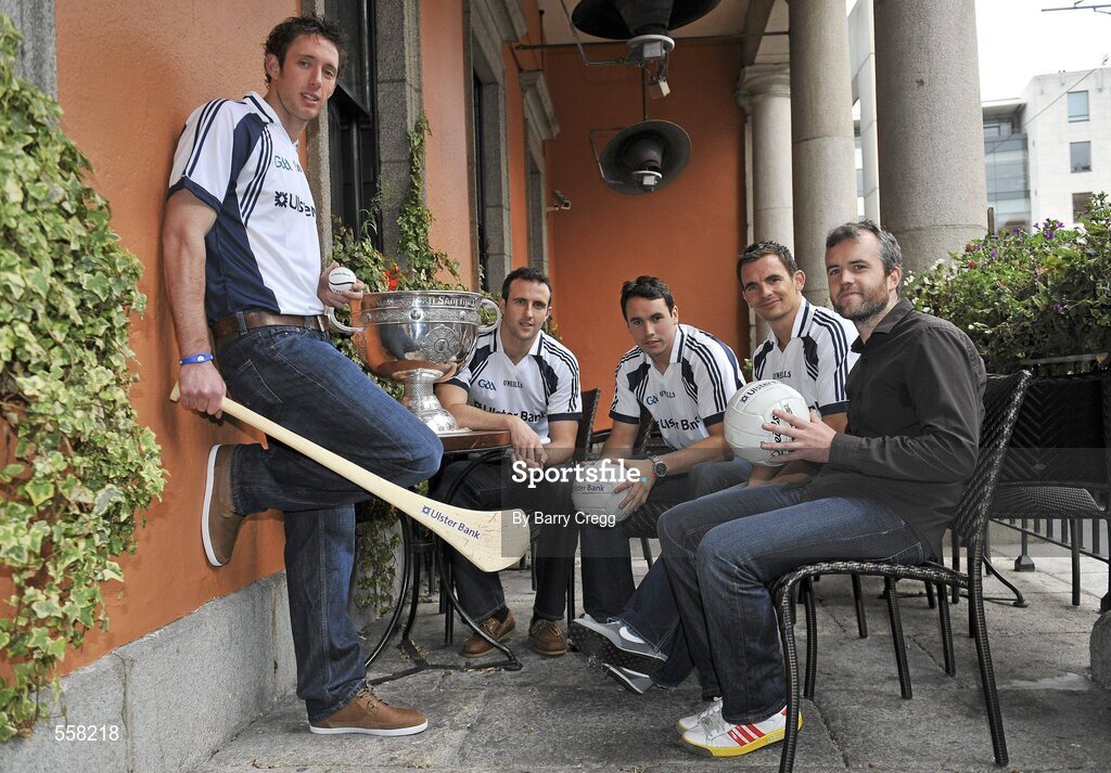 12 September 2011; Ulster Bank GAA stars,from left to right, 2011 All-Ireland medal winner Michael Fennelly, Galway footballer Joe Bergin, Galway footballer Finian Hanley, and Down footballer Danny Hughes with the Sam Maguire cup and Newstalk 106-108fm presenter Eoin McDevitt at the 2011 ‘Off the Ball Roadshow with Ulster Bank’ finale. The Ulster Bank GAA stars were out in force, alongside a host of sporting greats, as the finale of the 2011 ‘Off the Ball Roadshow with Ulster Bank’ took over the Odeon Bar on Dublin’s Harcourt Street on Monday, 12th September. For the third year running, Ulster Bank teamed up with Newstalk 106-108 fm to take Ireland’s most popular sports programme on a tour across the country, where rival Ulster Bank GAA stars have featured in live shows in Kerry, Cork, Donegal, Limerick, Tipperary, Galway and Roscommon, throughout the summer. This year also saw the introduction of a major new club focused initiative – ‘Ulster Bank GAA Force’. The initiative was set up to support local GAA clubs across the country by giving them the opportunity to refurbish and upgrade their facilities. The Odeon Bar, Harcourt Street, Dublin. Picture credit: Barry Cregg / SPORTSFILE