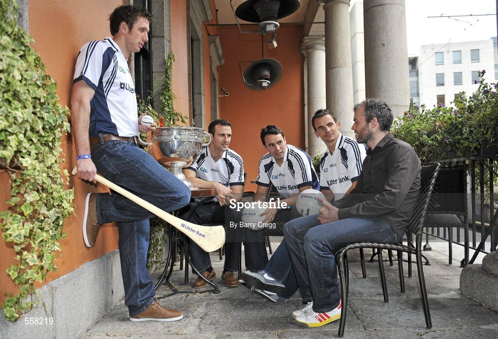 12 September 2011; Ulster Bank GAA stars,from left to right, 2011 All-Ireland medal winner Michael Fennelly, Galway footballer Joe Bergin, Galway footballer Finian Hanley, and Down footballer Danny Hughes with the Sam Maguire cup and Newstalk 106-108fm presenter Eoin McDevitt at the 2011 ‘Off the Ball Roadshow with Ulster Bank’ finale. The Ulster Bank GAA stars were out in force, alongside a host of sporting greats, as the finale of the 2011 ‘Off the Ball Roadshow with Ulster Bank’ took over the Odeon Bar on Dublin’s Harcourt Street on Monday, 12th September. For the third year running, Ulster Bank teamed up with Newstalk 106-108 fm to take Ireland’s most popular sports programme on a tour across the country, where rival Ulster Bank GAA stars have featured in live shows in Kerry, Cork, Donegal, Limerick, Tipperary, Galway and Roscommon, throughout the summer. This year also saw the introduction of a major new club focused initiative – ‘Ulster Bank GAA Force’. The initiative was set up to support local GAA clubs across the country by giving them the opportunity to refurbish and upgrade their facilities. The Odeon Bar, Harcourt Street, Dublin. Picture credit: Barry Cregg / SPORTSFILE